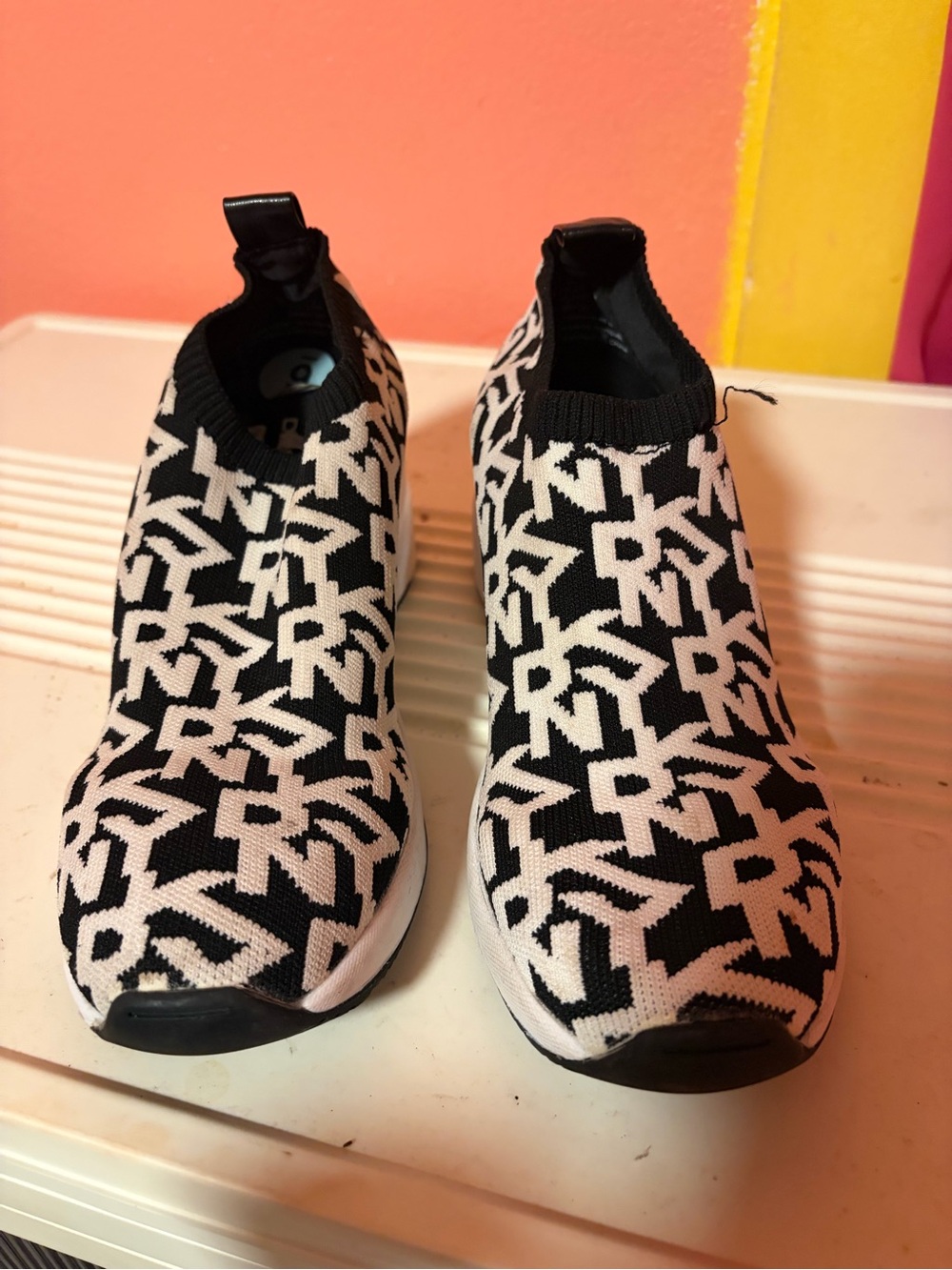 DKNY Black & White Logo Knit Slip-On Sneakers